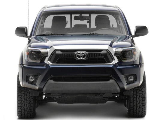 Raxiom 12-15 Toyota Tacoma Axial Series Switchback Projector Headlights- Black Housing- Clear Lens