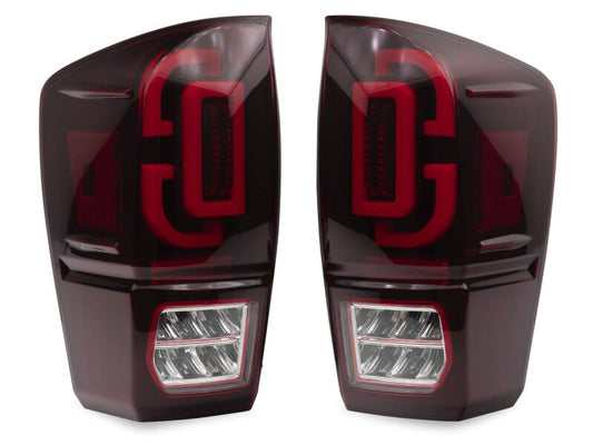 Raxiom 16-23 Toyota Tacoma XW Series Sequential LED Tail Lights- Black Housing- Red Lens