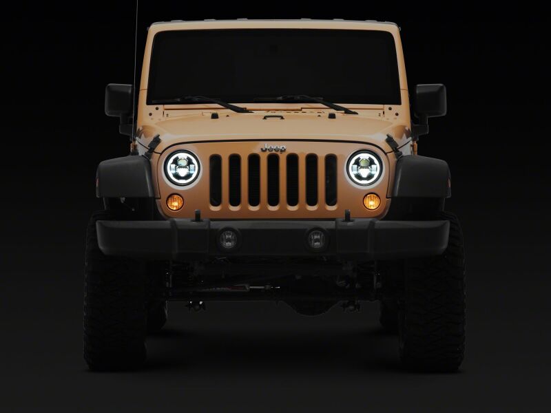 Raxiom 07-18 Jeep Wrangler Axial Series 7-Inch LED Headlights w DRL/ Black Housing - Clear Lens