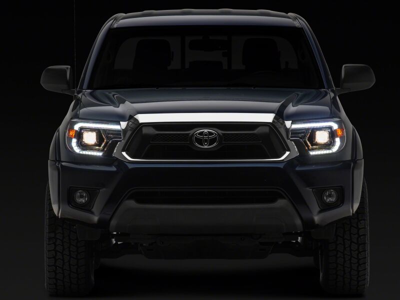 Raxiom 12-15 Toyota Tacoma Axial Series Switchback Projector Headlights- Chrome- Clear Lens