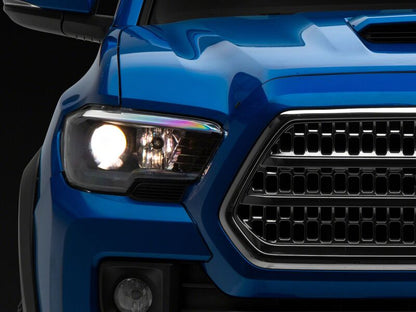 Raxiom 16-23 Toyota Tacoma Axial Series OE Replacement Headlights- Black Housing- Clear Lens