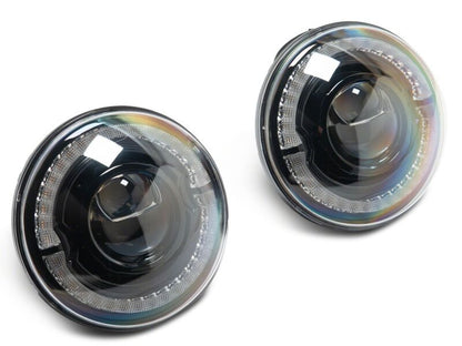 Raxiom 18-26 Jeep Wrangler JL/ 20-26 Gladiator JT HiOutput LED Hlights/Angel Eye DRL-Blk-Clear Lens