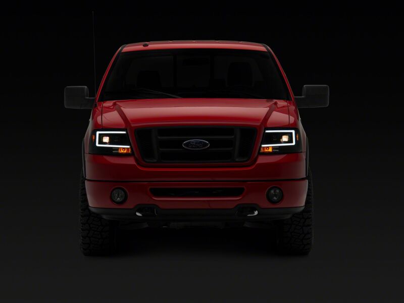 Raxiom 04-08 Ford F-150 Axial Series Projector Headlights- Black Housing- Clear Lens