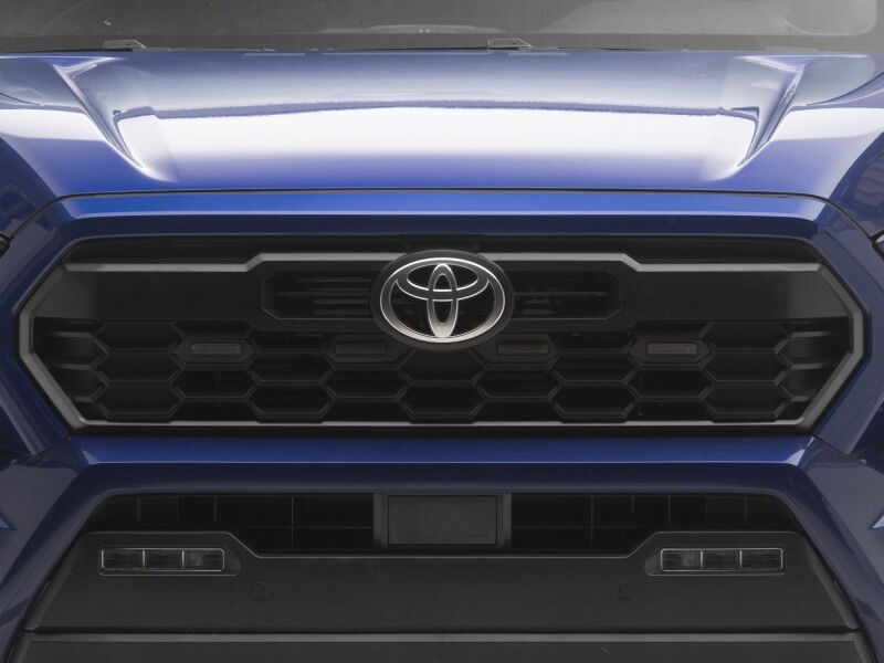 Raxiom 24-26 Toyota Tacoma Pre Runner/TRD Off-Road/TRD Sport White LED Grille Light- Smoked Lens
