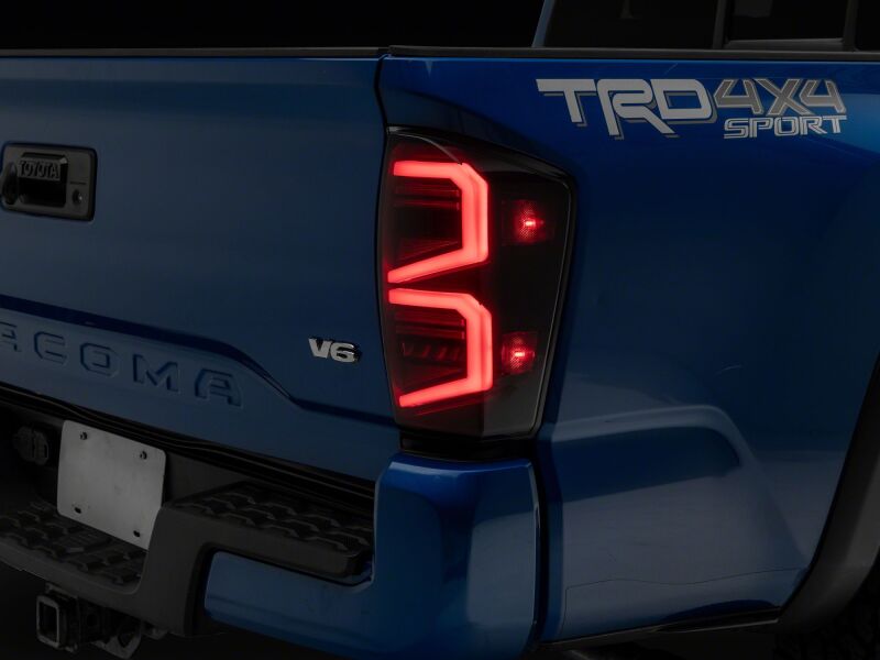 Raxiom 16-23 Toyota Tacoma ST LED Tail Lights- Black Housing- Smoked Lens