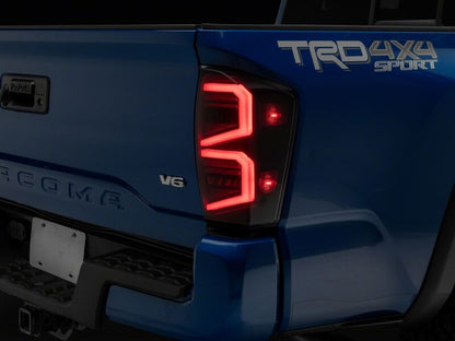 Raxiom 16-23 Toyota Tacoma ST LED Tail Lights- Black Housing- Smoked Lens