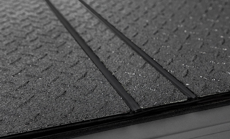 Access 19-23 Ford Ranger 5ft Bed LOMAX Tri-Fold Cover - Urethane Diamond Plate