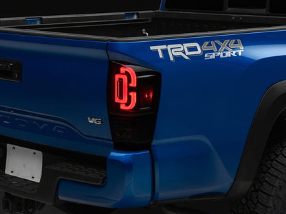 Raxiom 16-23 Toyota Tacoma XW Series Sequential LED Tail Lights- Black Housing/ Smoked Lens